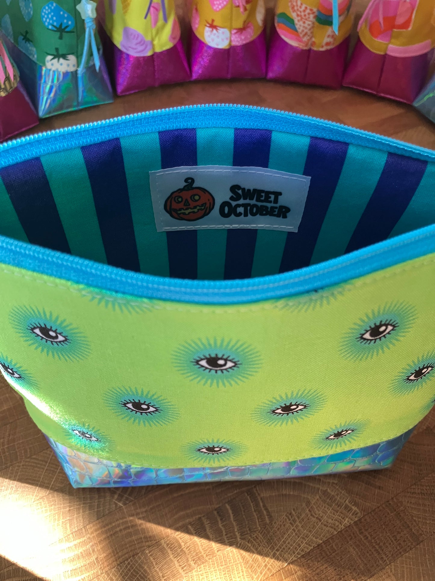 Lime-Eyed + Holographic Vinyl Cosmetic Bag
