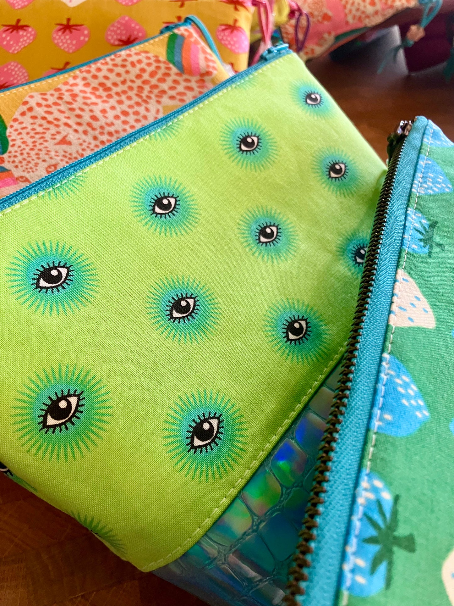 Lime-Eyed + Holographic Vinyl Cosmetic Bag